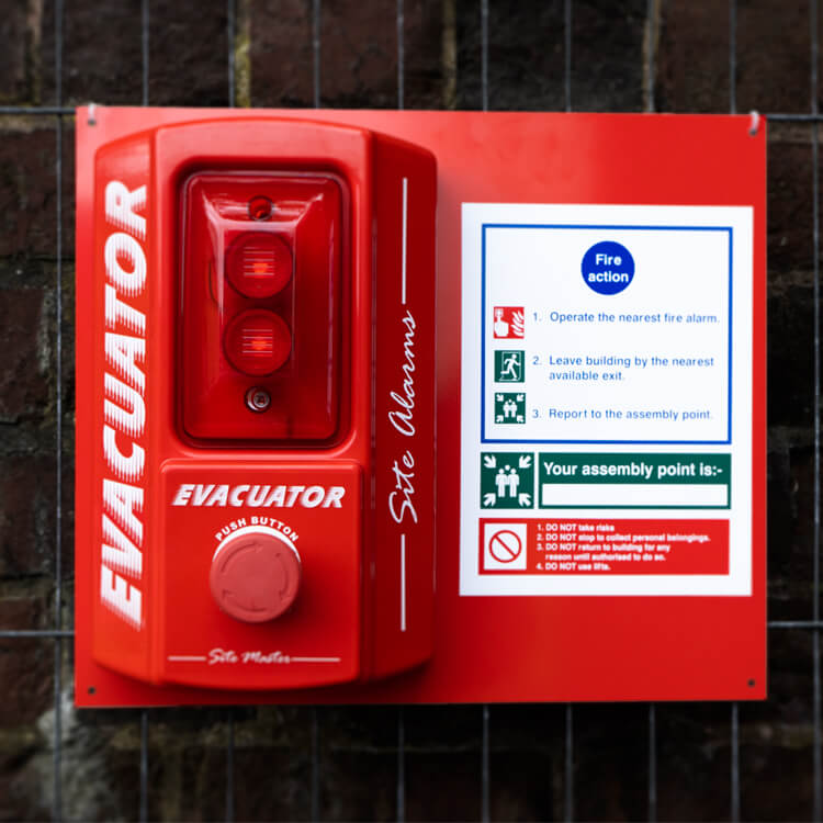 Alarm mounting board on a fence